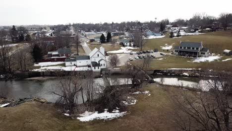 Winter-Time-Aerial-Drone-Video-Of-The-Skunk-River-And-The-Rich-Agricultural-Farmland-Surrounding-Rural-Lynnville,-Iowa