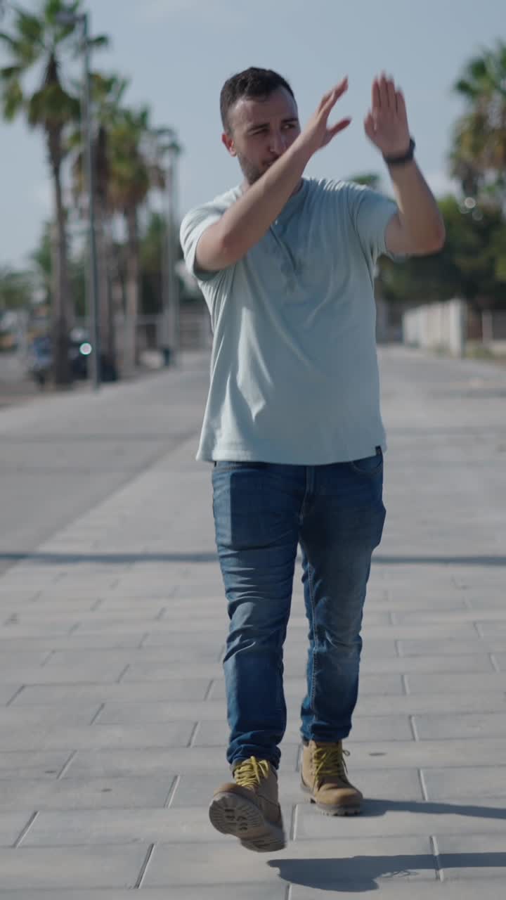 Man walking on a sunny street