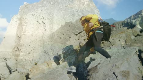 Animation-of-landscape-over-caucasian-female-hiker-walking