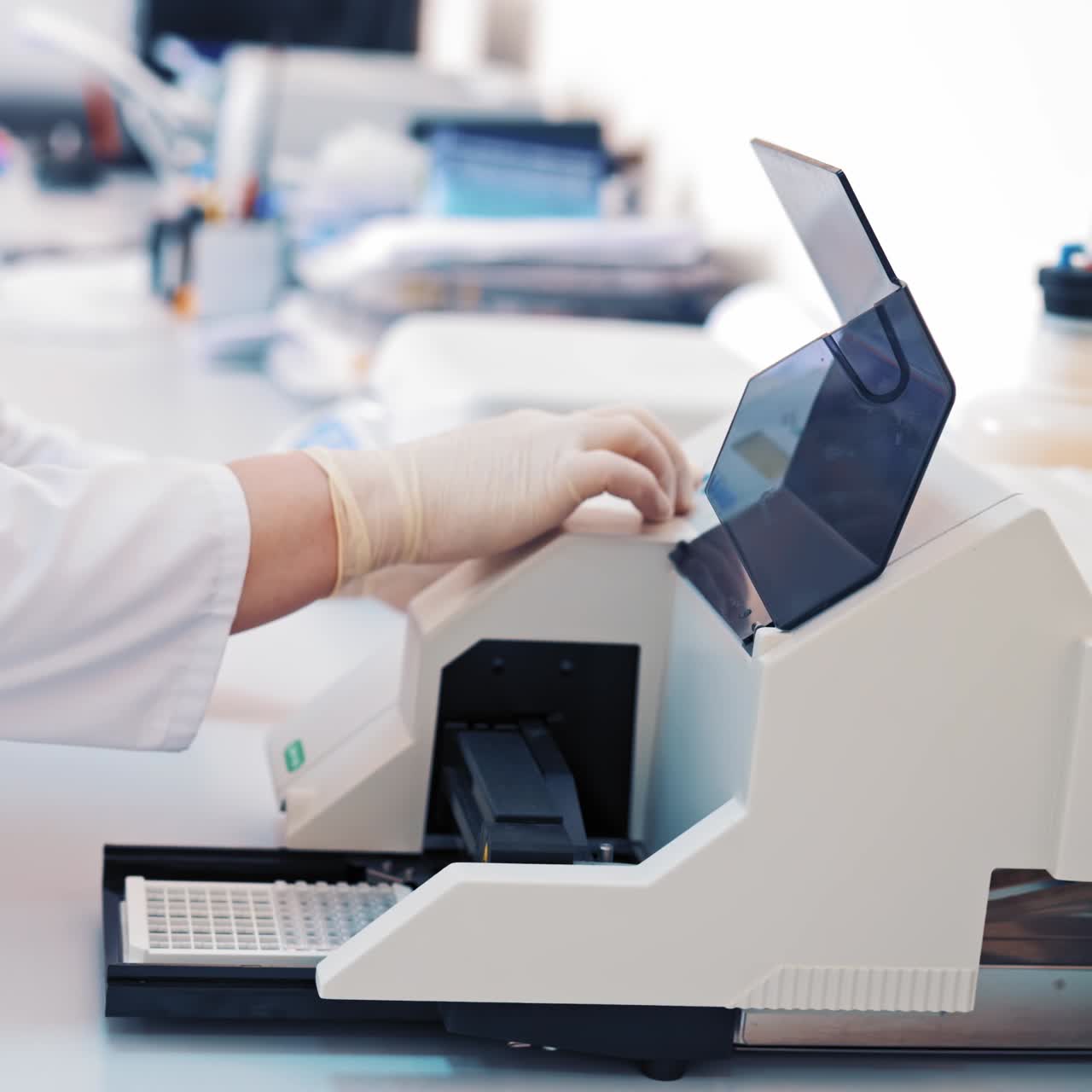 Clinician with equipment in laboratory