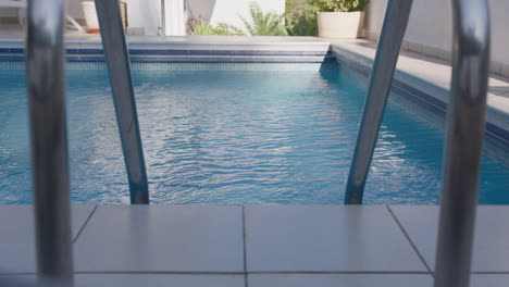 swimming pool entrance viewed through ladder