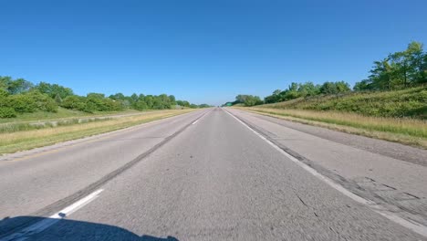 pov while driving on interstate 80 through rural illinois