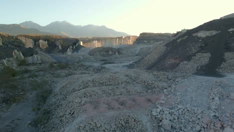 Sunrise-in-the-sillar-quarries,-the-main-quarry-of-Añashuayco,-where-the-sillar-is-extracted-and-a-tourist-area-where-the-extraction-of-the-sillar-by-stonemasons-is-currently-contemplated