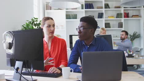 Colleagues discussing about a work