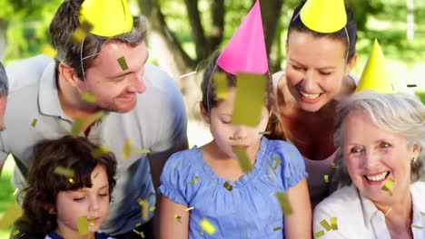 animación de confeti sobre una familia feliz en una fiesta de cumpleaños