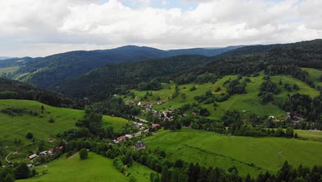 scenic landscape of tranquil village in beskid sadecki mountains southern poland