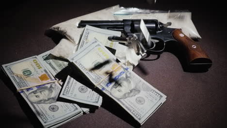 bullets fall on money and drug bags