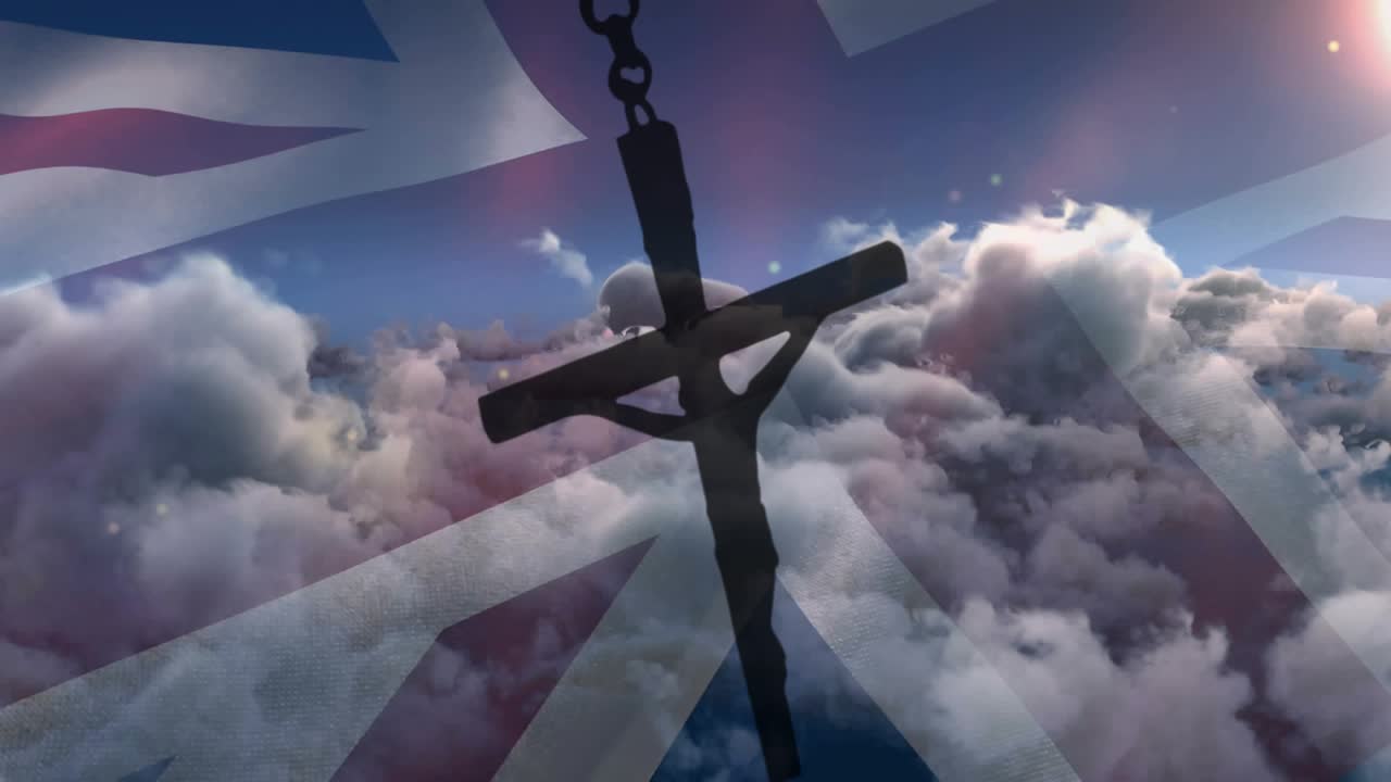 Sun flare appearing, crucifix swinging, clouds shifting, Union Jack drifting, evoking calm ascent