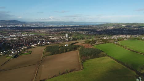 Aerial-flyover-of-east-Belfast-from-the-countryside-looking-towards-the-city-centre-or-center