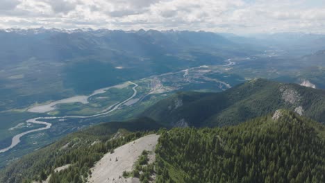 mount 7 from beaverhead mountain peak with blaeberry river in golden, british columbia, canada. - aerial shot
