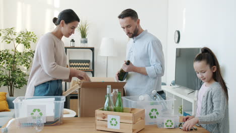 family recycling at home
