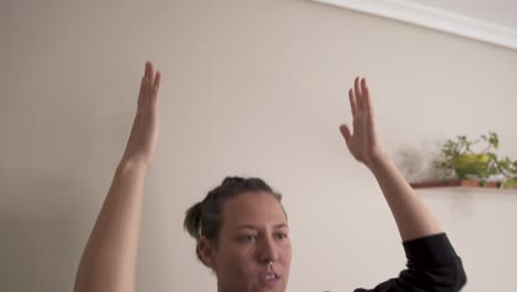 woman doing multiple squats at home