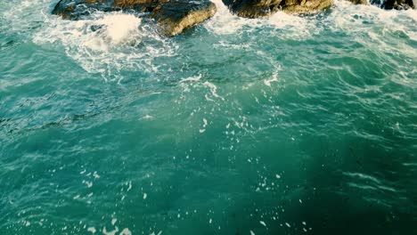 transition from sea to shore with rocks