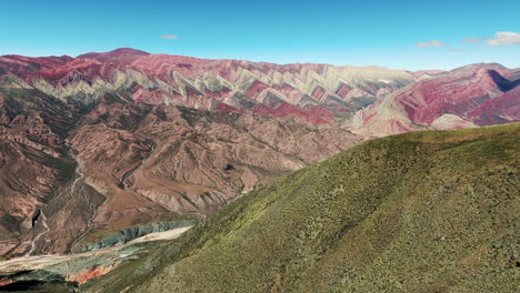 A-breathtaking-aerial-view-of-the-Hornocal,-also-known-as-Cerro-de-los-14-Colores,-in-the-Quebrada-de-Humahuaca,-Jujuy,-Argentina