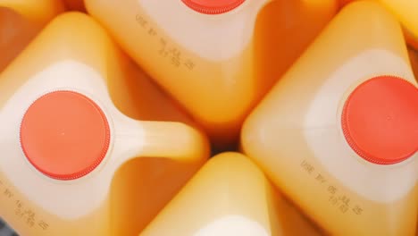 orange juice containers stacked