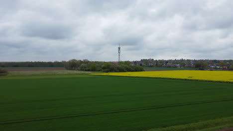 A-flight-over-fields-towards-an-antenna