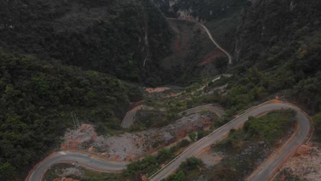 Aerial-view-of-green-valley-at-Khau-Coc-Cha-Mountain-Pass,-Vietnam