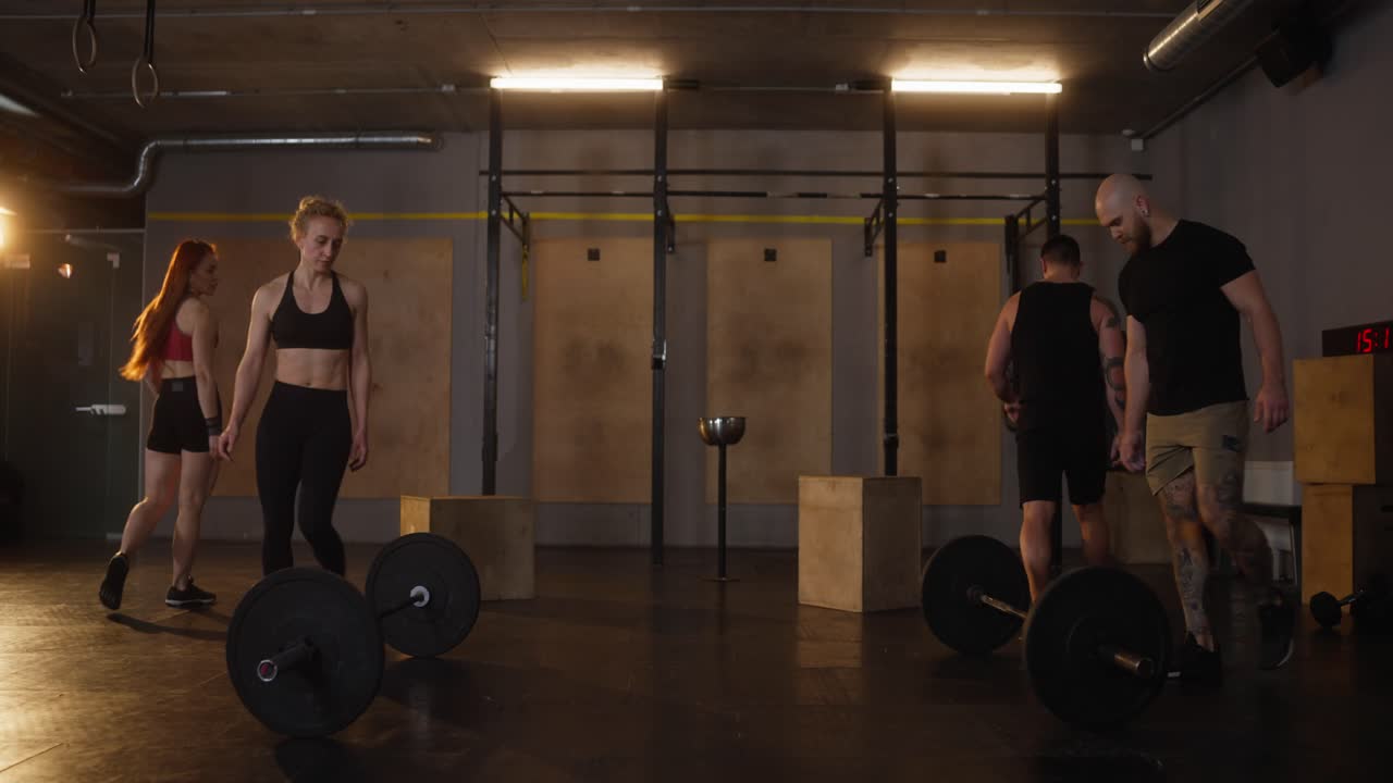 Group weightlifting session in a gym