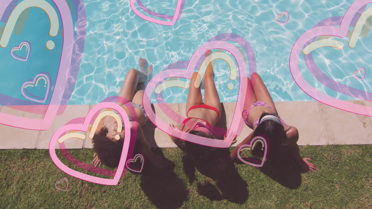 Three people relaxing by poolside with colorful heart animations overlaying