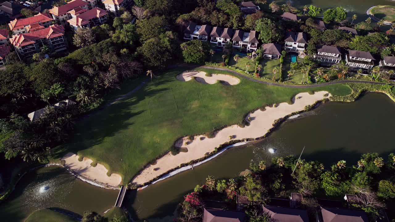 Drone footage of a unique golf village in Bali’s Nusa Dua area, combining water features, green design, and tropical nature. A relaxing escape and cinematic natural scene
