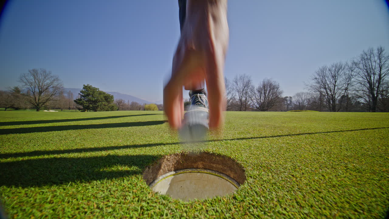 Young golfer playing on a sunny spring day in Switzerland, showcasing precise chipping, putting, bunker, and approach shots. Perfect for sports, lifestyle, and outdoor themes.