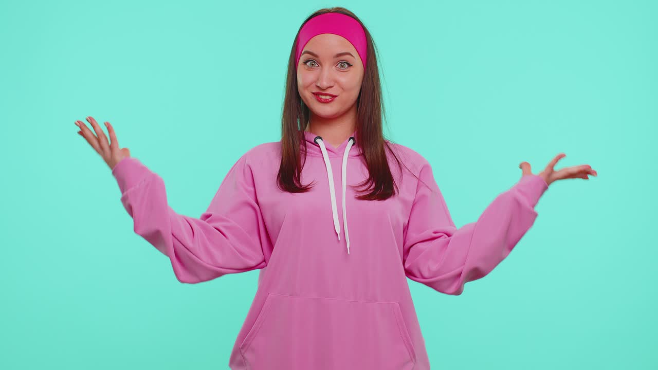 Excited amazed girl looking shocked surprised wow showing hands brain explosion head gesture wow