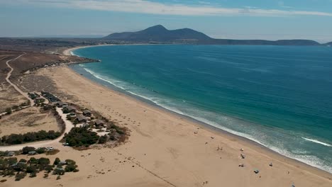 aerial panorama of basin and mountains on the background