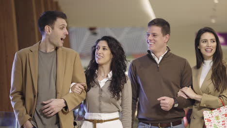 friends enjoying a shopping trip at the mall