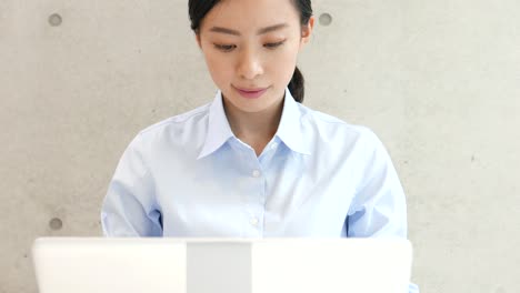 young business woman using pc