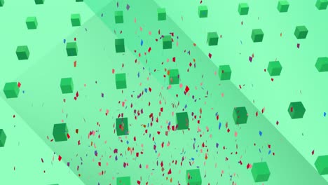 animación de confeti cayendo sobre filas de cubos de navidad moviéndose sobre un fondo verde.