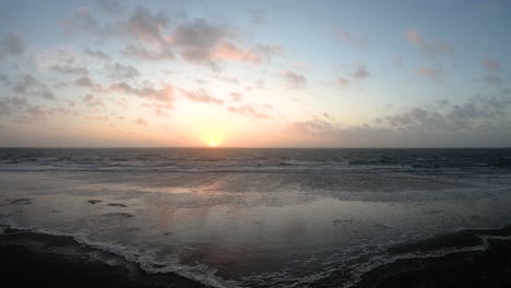 sunset on a windy day at the beach