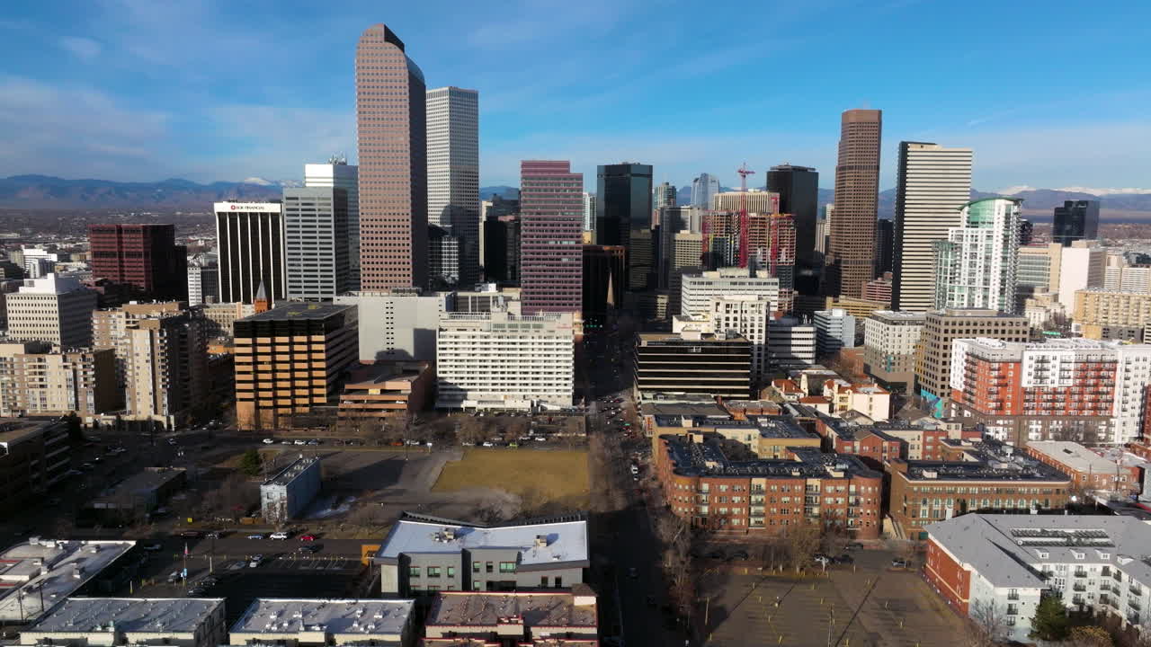 City of Denver with mountain backdrop aerial