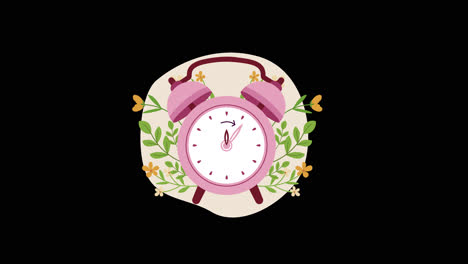 pink alarm clock with floral design