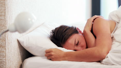 Asleep-pretty-woman-in-her-bed