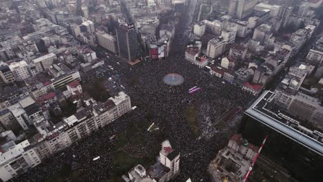 massive antigovernment protest in belgrade, serbia. aerial drone view of crowds at slavija square