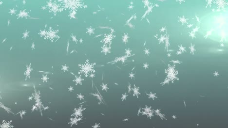 copos de nieve cayendo contra un fondo verde