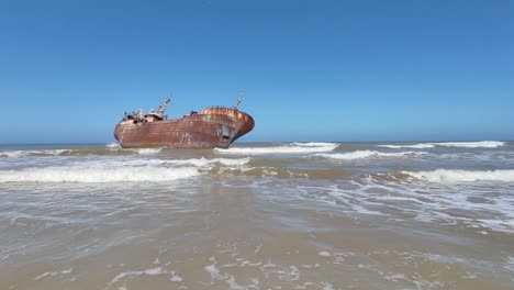 abandoned fishing boat after it ran aground and crashed on the shores