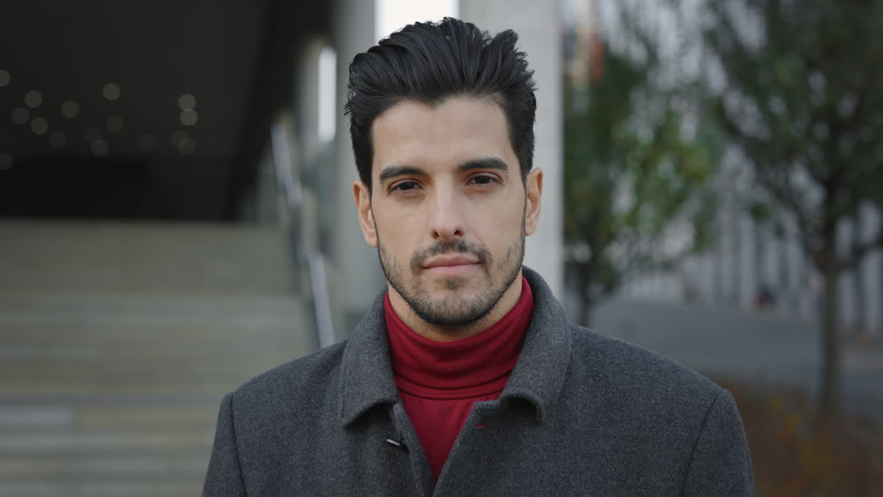 Portrait of a man in a coat and turtleneck