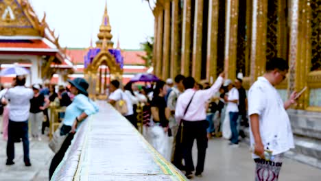 visitors admire intricate temple art and architecture