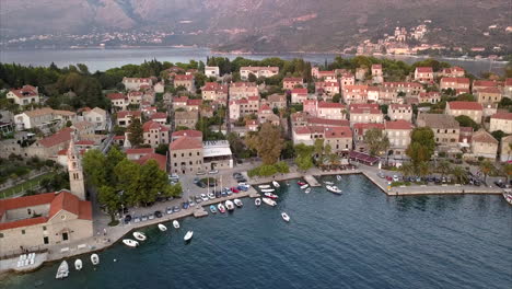 Panning-aerial-shot-with-close-view-of-small-Croatian-village-on-sea-front