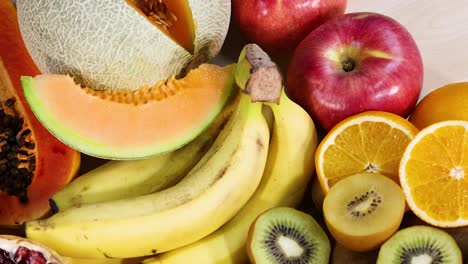 variety of fruits displayed on a white background