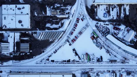 Top-down-aerial-view-of-the-warehouse-district-during-winter