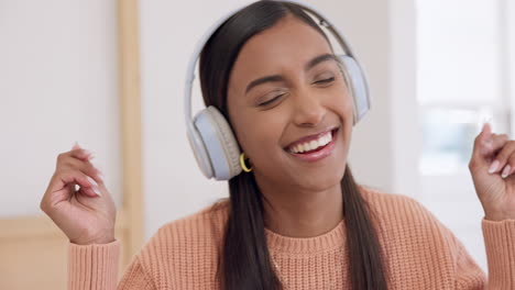 Headphones,-dancing-and-happy-woman-listening-to