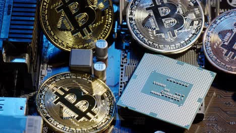 Bitcoin-BTC-and-CPU-central-processor-on-digital-technology-pc-motherboard,-mining-cryptocurrency