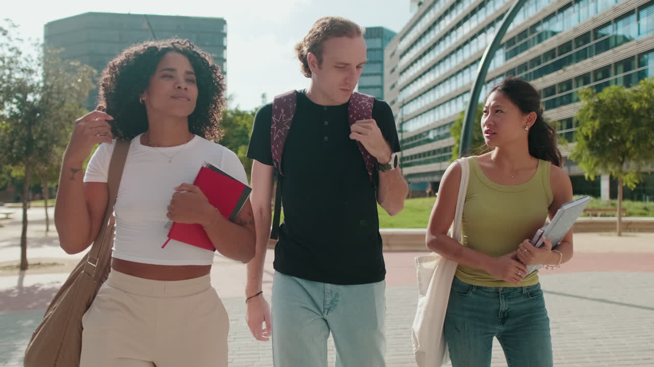 Side view of young people, teenagers, male and female students spending time