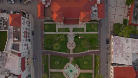 on a summer morning just after sunrise, a straight down aerial view of the ponce de leon hotel in st