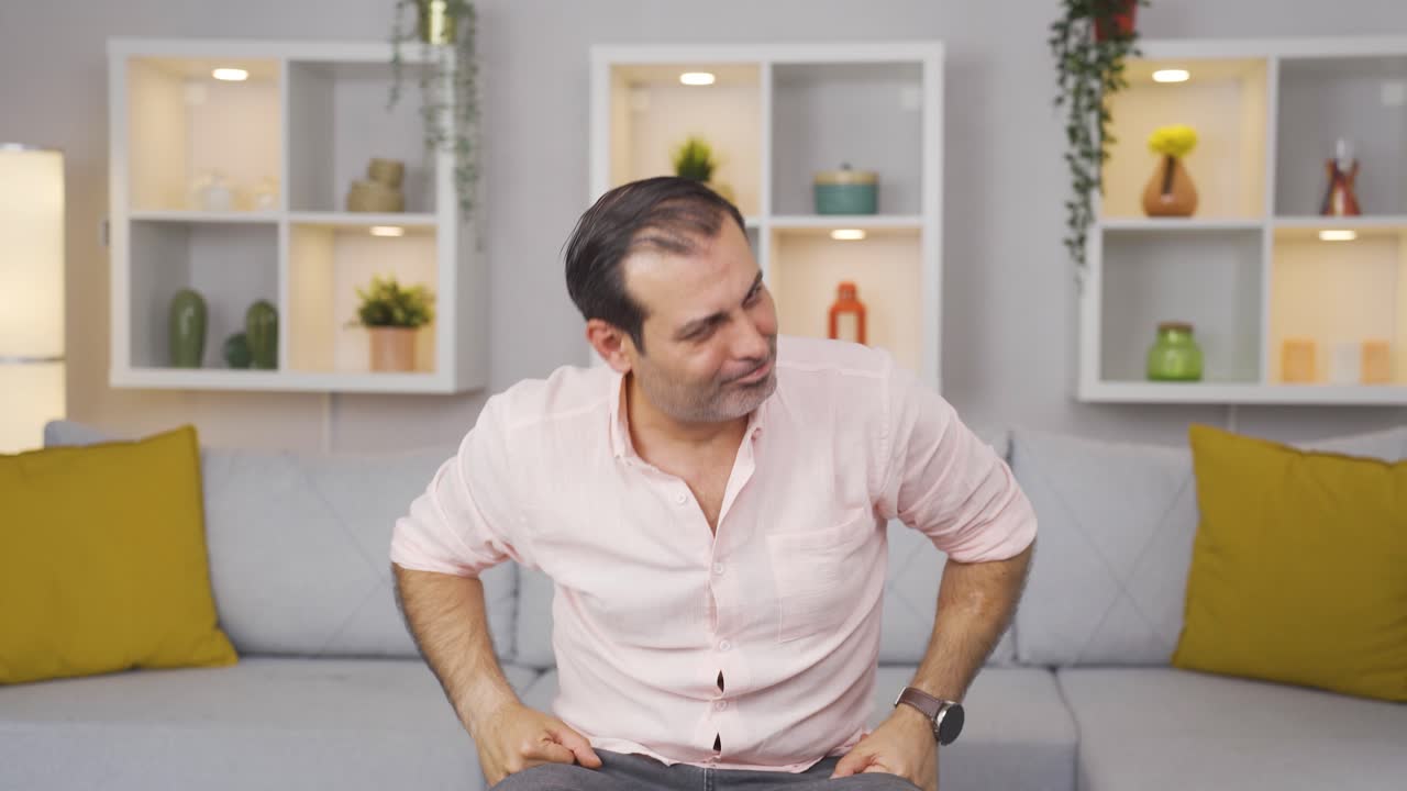 Man doing rocker sign and dancing.