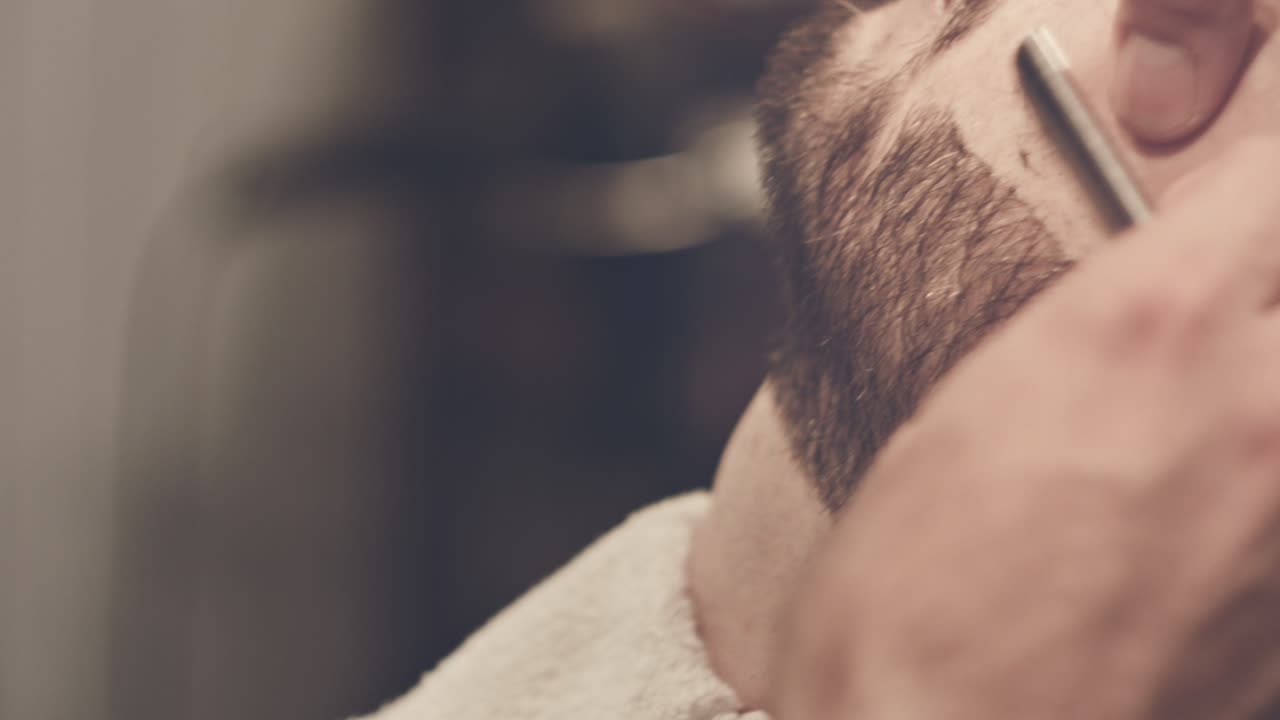 Barber shave. Barber shaving. Straight razor shave. Barber shaving beard