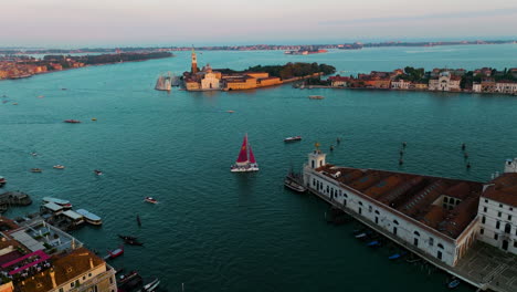 Aerial-View-Of-Punta-della-Dogana-Art-Museum-And-Trabaccolo-In-Venezia-VE,-Italy