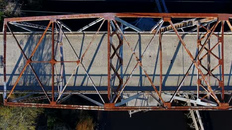 aerial view of a rusty old bridge